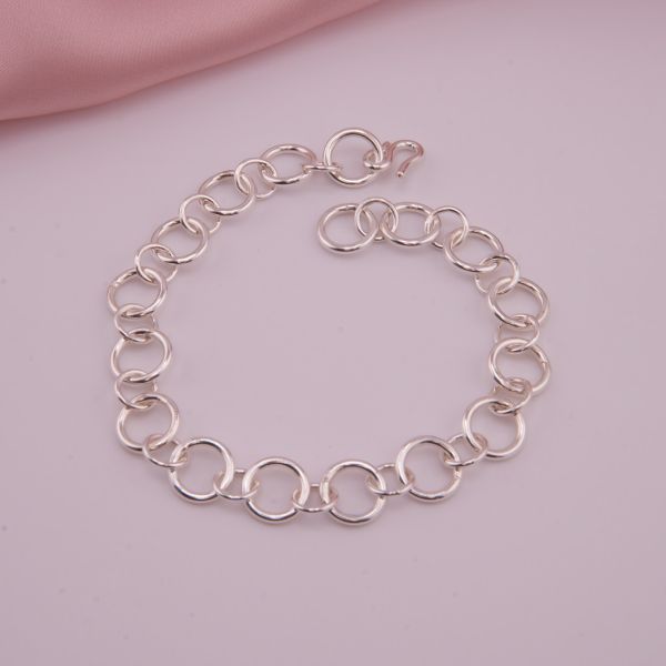 Hochglanzpoliertes Silber-Gliederarmband aus Sterling Silber mit S-Haken-Verschluss in 10 mm Breite.